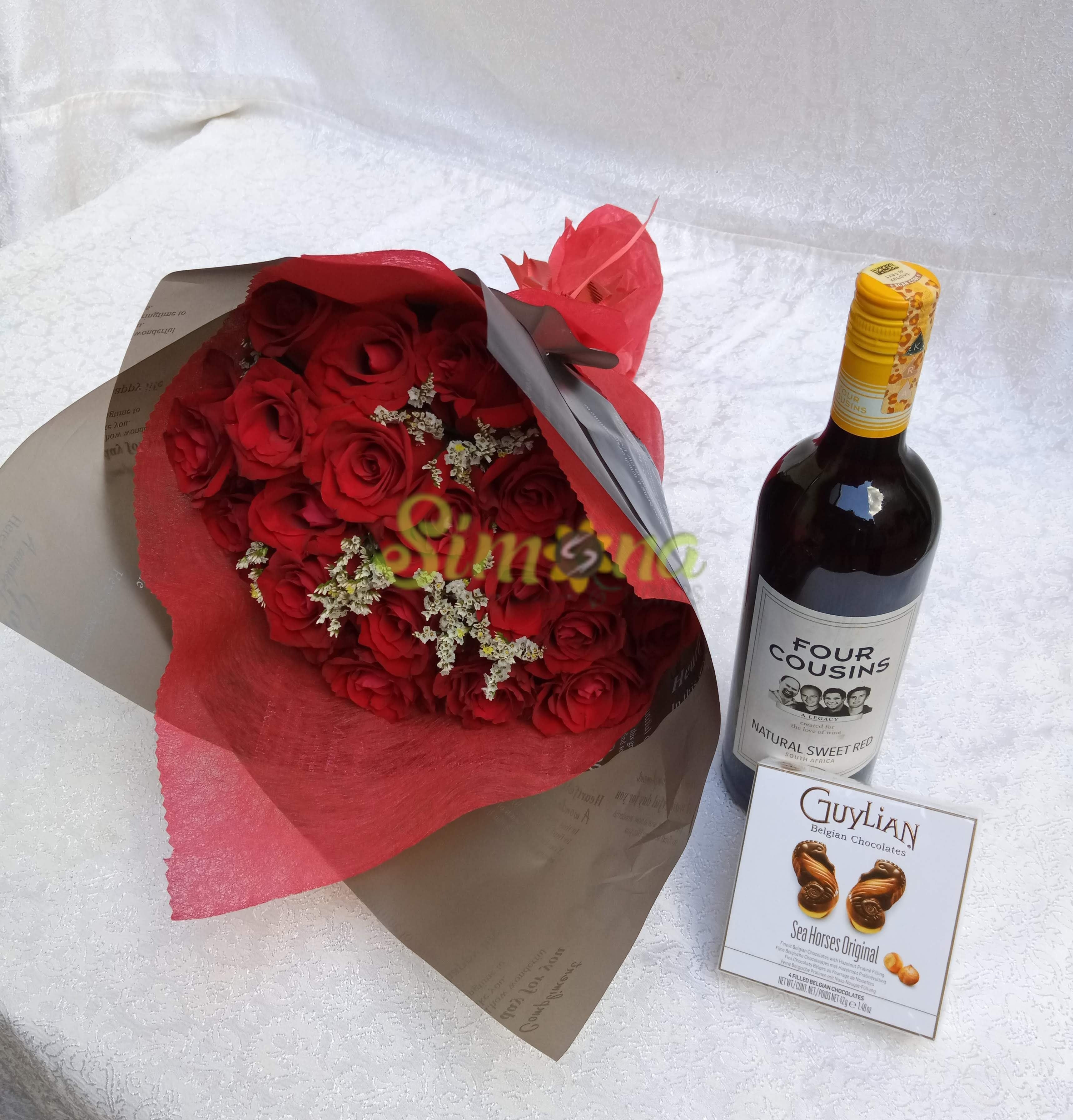 Delightful hand bouquet and small guylian chocolate