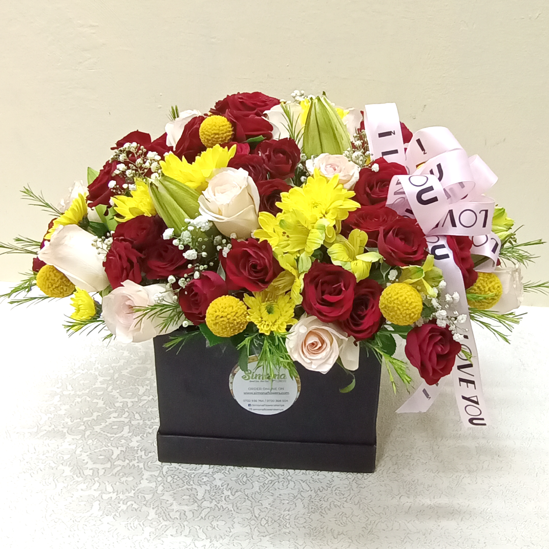 Simona Flowers Kenya - Get a thoughtful royal blessings bouquet that will congratulate them for days on for their new bundle of joy and to welcome the new baby into the family. The Royal Blessings Bouquet comprises of: Red Roses Pink Roses Yellow Chrysanthemums Lilies Alstromeria Flowers & Seasonal Foliage