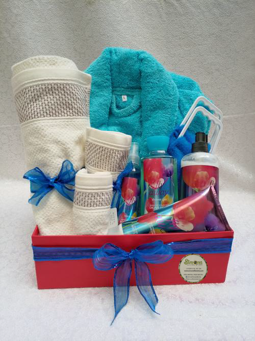 Simona Flowers Gifts - Nothing shows your love and thoughtful care to someone better than a care package. This unisex bath care package is equipped with : A bathrobe, 3 piece Towel-set, Body scrubber and A perfume set of your choice