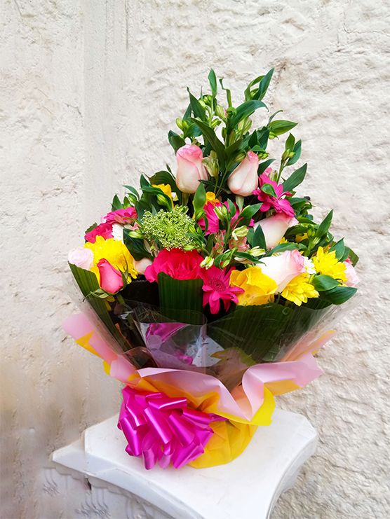 A nice water bouquet mixture of roses, alstroemeria and chrysanthemums