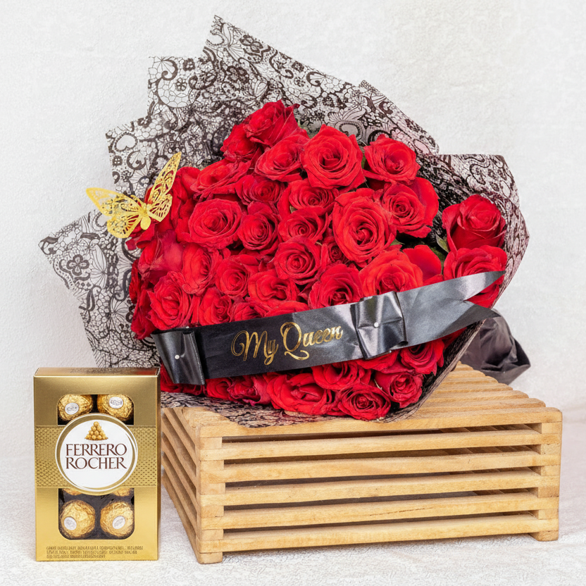 Heart-shaped arrangement of red roses with a Ferrero Rocher chocolate box on a white background
