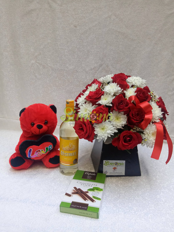 Adorable bouquet with dotted box hamlet chocolate, teddy bear and red wine