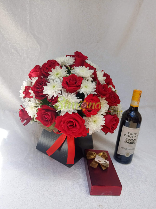 Adorable bouquet with red wine and Guylian chocolate