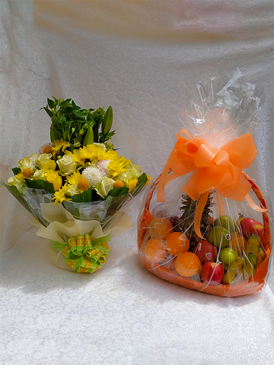Agnes package of a water bouquet flower arrangement and fruit basket