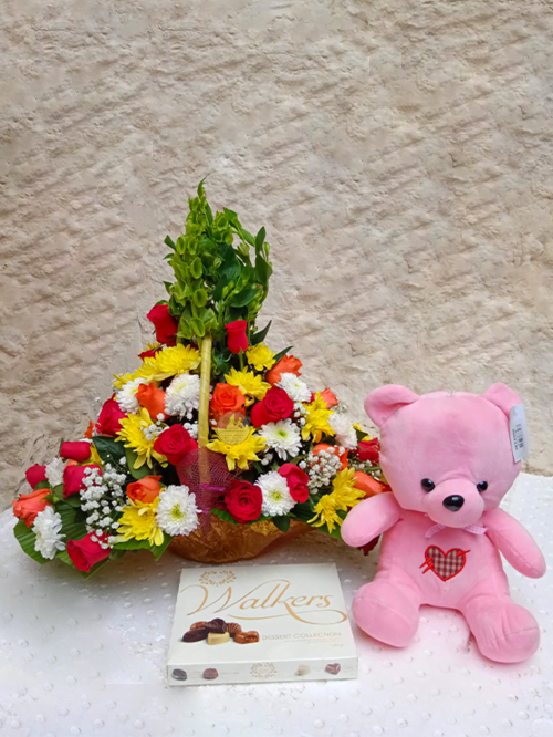 Simona Flowers and Gifts - Flower basket, Teddy bear and chocolate.