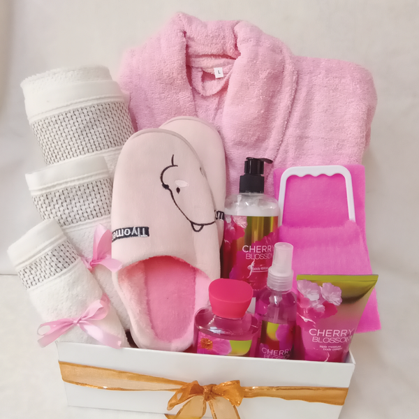 A bath care set package consisting of a bat robe, cherry blossom perfume set of a body spray, shower gel, body lotions; a pair of indoor sandals and a set of three bath towels