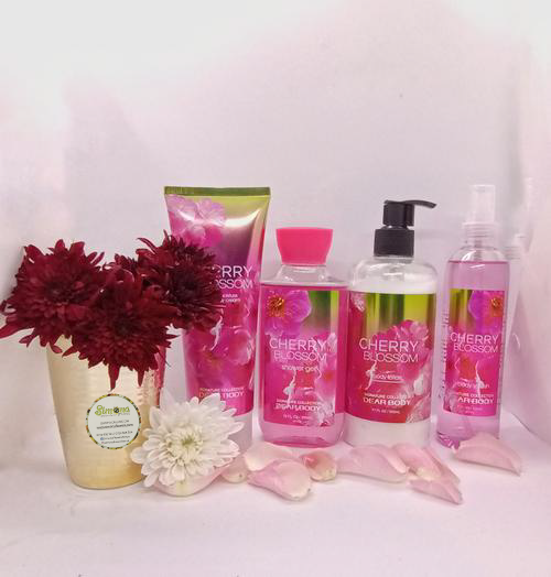 Simona Flowers Gifts - The Cherry blossom perfume set is a great gift to give your special lady. With a nice pink theme, the package for her consists of  a body splash, body lotion, body cream and shower gel.