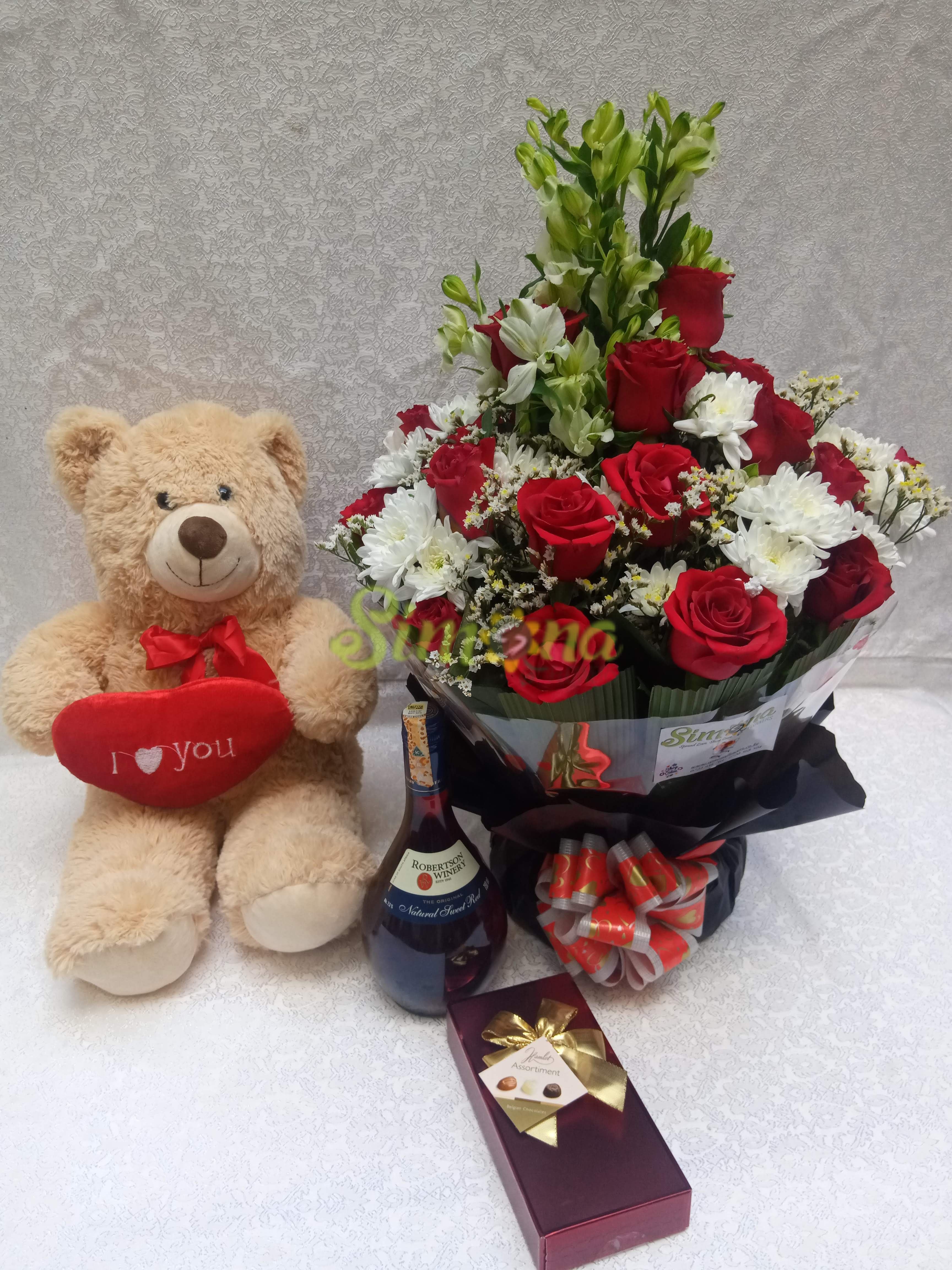 Diamond bouquet with red wine , Guylian chocolate and teddy bear