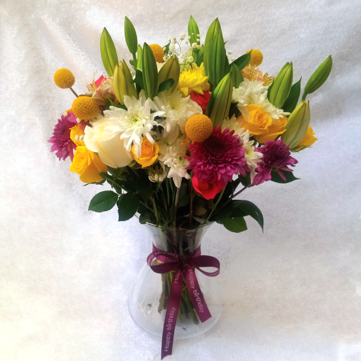Garden Dreams Vase Flowers Arrangement by Simona Flowers Kenya. A perfect mix of tropical flowers best as birthday gifts to a mother, father, sister, brother, girlfriend, boyfriend, husband, wife and in-laws.