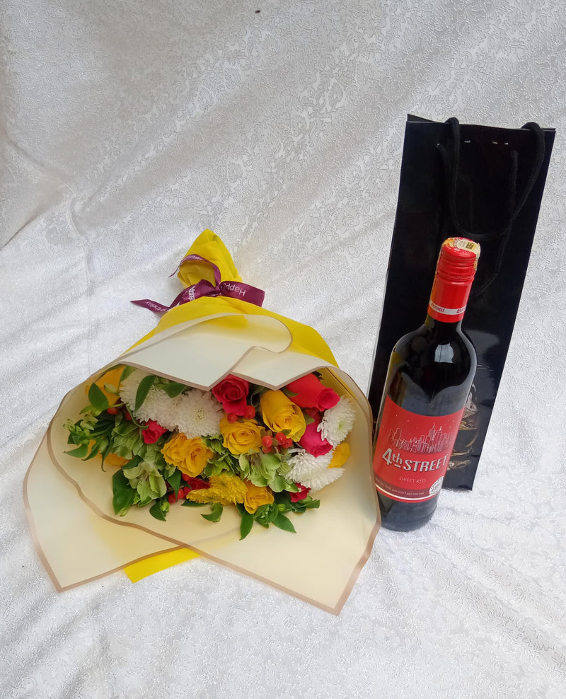 Janice bouquet pack of flowers and fourth street wine wine by Simona Flowers