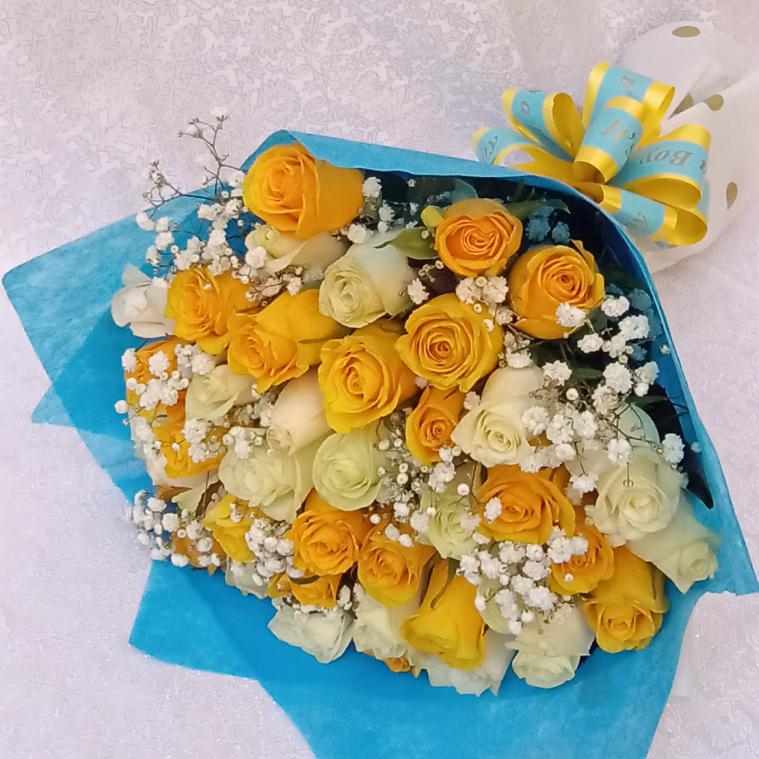 One of A Kind Bouquet by Simona Flowers Kenya, consists of:  Yellow Roses, White/Cream Roses, Alstroemeria Flowers and Beautiful flower fillers, and wrapped to compliment the theme for the occasion. Can be presented during any occasion, to their doorstep and on the same day.