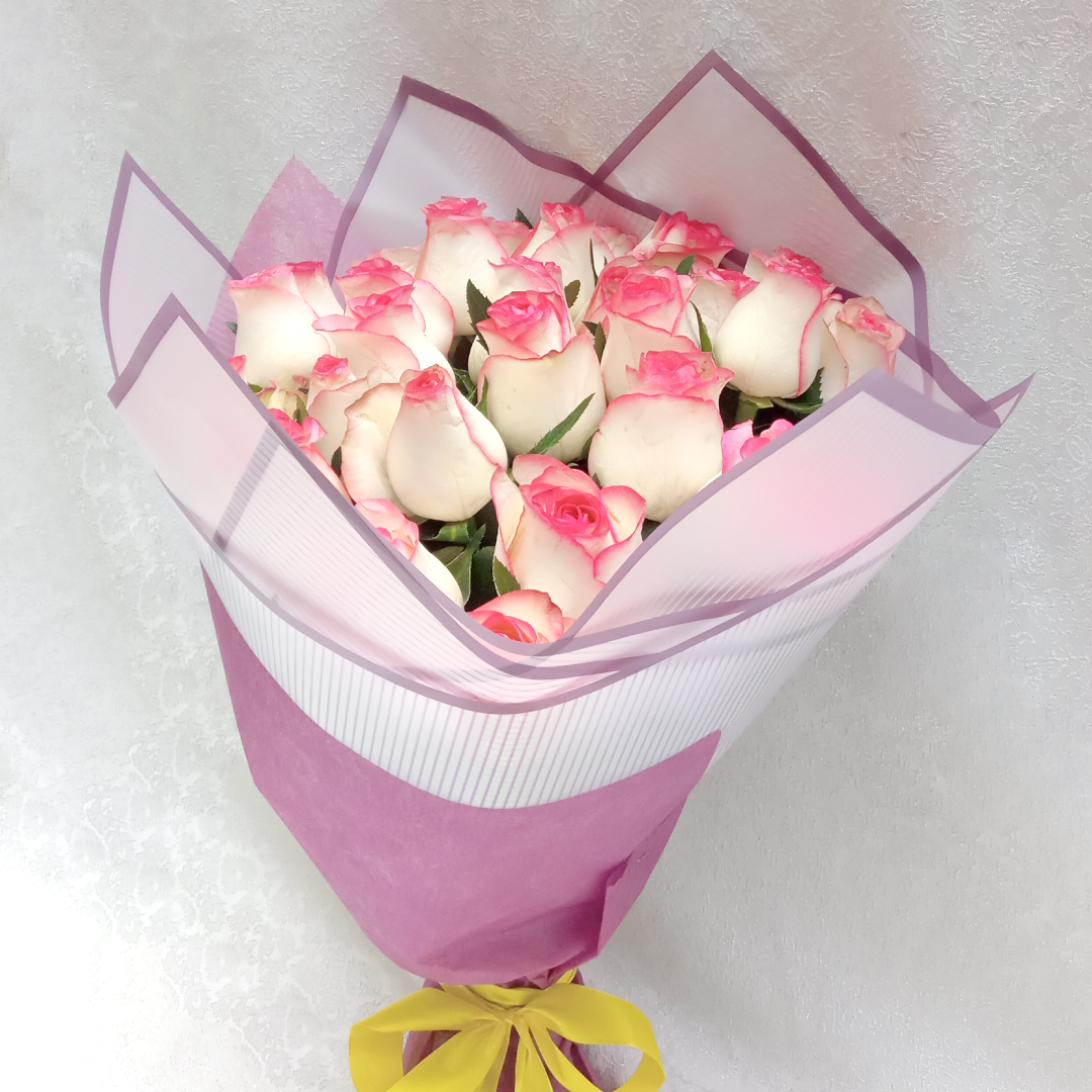 Pretty in Pink hand Bouquet by Simona Flowers Kenya, Pink is the color of grace, gentility, and happiness. A gracefully gorgeous bouquet of pink roses is great to present to your loved one with a card that expresses your appreciation for them.
