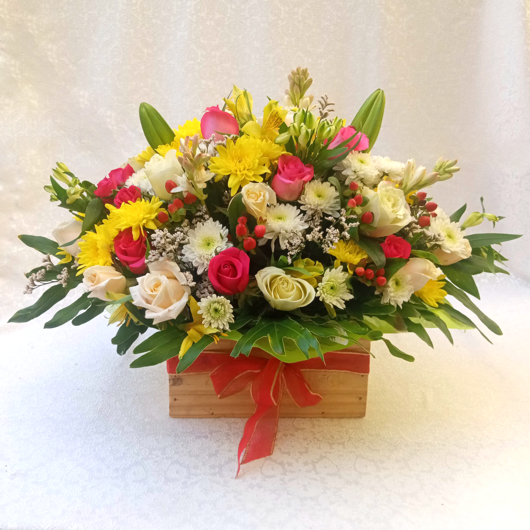 The Pure Opulence bouquet by Simona Flowers Kenya, is a magnificent arrangement of flowers arranged with :  Roses Hypericum Flowers Chrysanthemums Alstromeria Flowers & Tropical Flower Fillers
