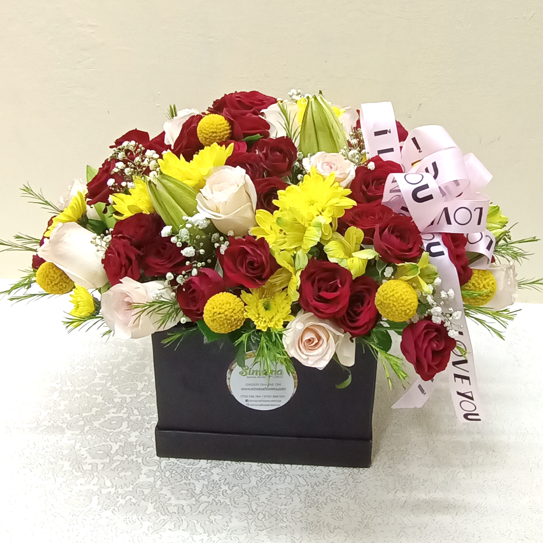 Simona Flowers Kenya - Get a thoughtful royal blessings bouquet that will congratulate them for days on for their new bundle of joy and to welcome the new baby into the family. The Royal Blessings Bouquet comprises of:  Red Roses Pink Roses Yellow Chrysanthemums Lilies Alstromeria Flowers & Seasonal Foliage