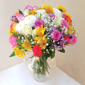 Thinking of You Vase Flower Arrangement by Simona Flowers Kenya. Consists of vibrant mix of flowers perfect to brighten up a loved one's day any day of the week and make them happy.