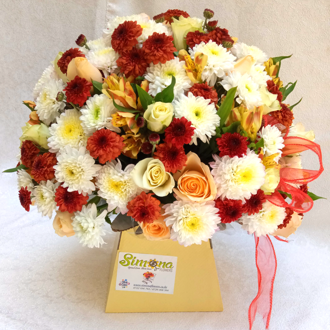 The Vibrant Royal Bouquet by Simona Flowers Kenya - contains Beautiful flowers arranged in a royal box and prepared with:  White Roses Cream Roses Alstromeria Flowers White chrysanthemums Carnations & Flower Fillers