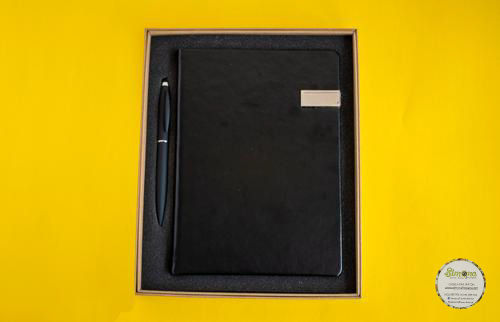 A simple but elegant gift set of a notebook and executive pen to make someone's day special. This classy gift is found in red, blue and black