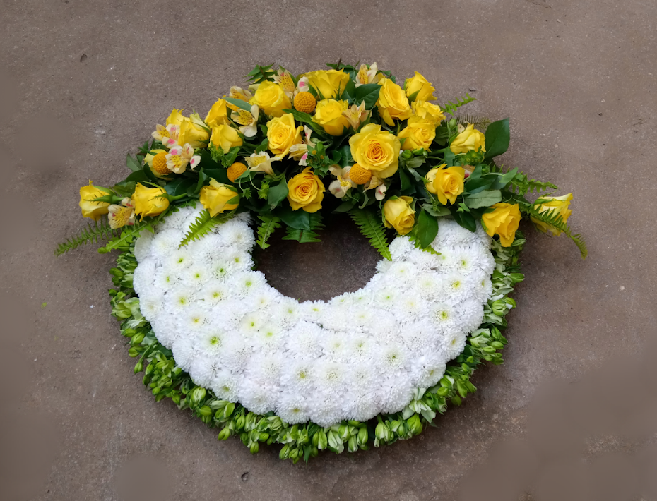 Executive glorious round funeral wreath by Simona Flowers