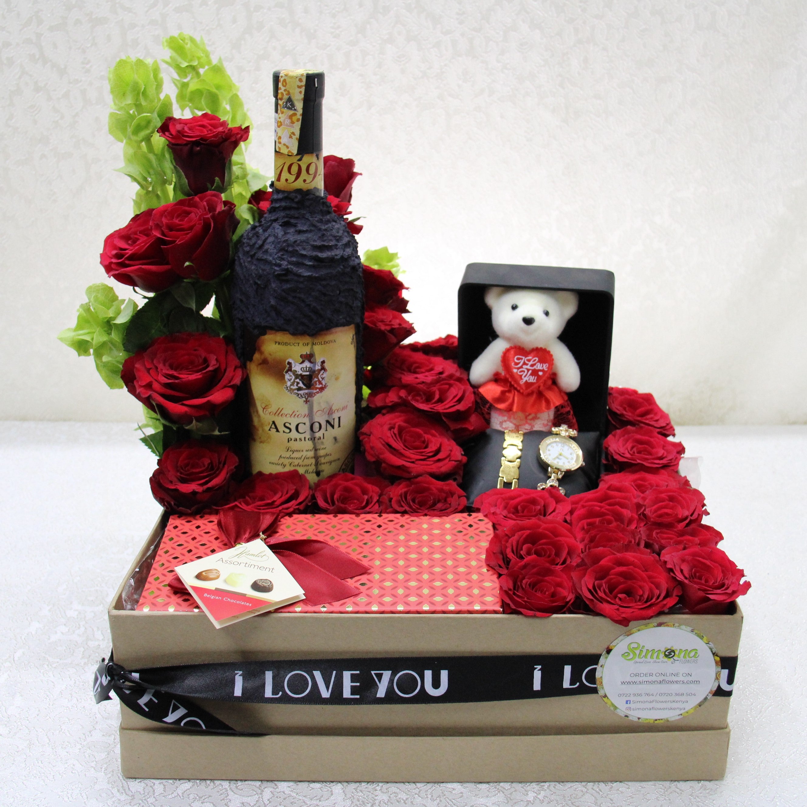 Simona Flowers - The intimate is a thoughtful pack of assorted gifts. The nice valentines surprise combo includes:   The Asconi wine A chain and bracelet set A small I love you teddy bear  A tasty box of hamlet love chocolates A well-arranged box of red valentine roses.