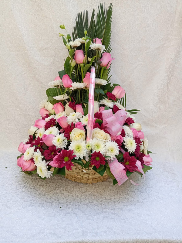 Simona Flowers - A pink themed flower basket that is prepared with roses, Chrysanthemums, and various flowers fillers