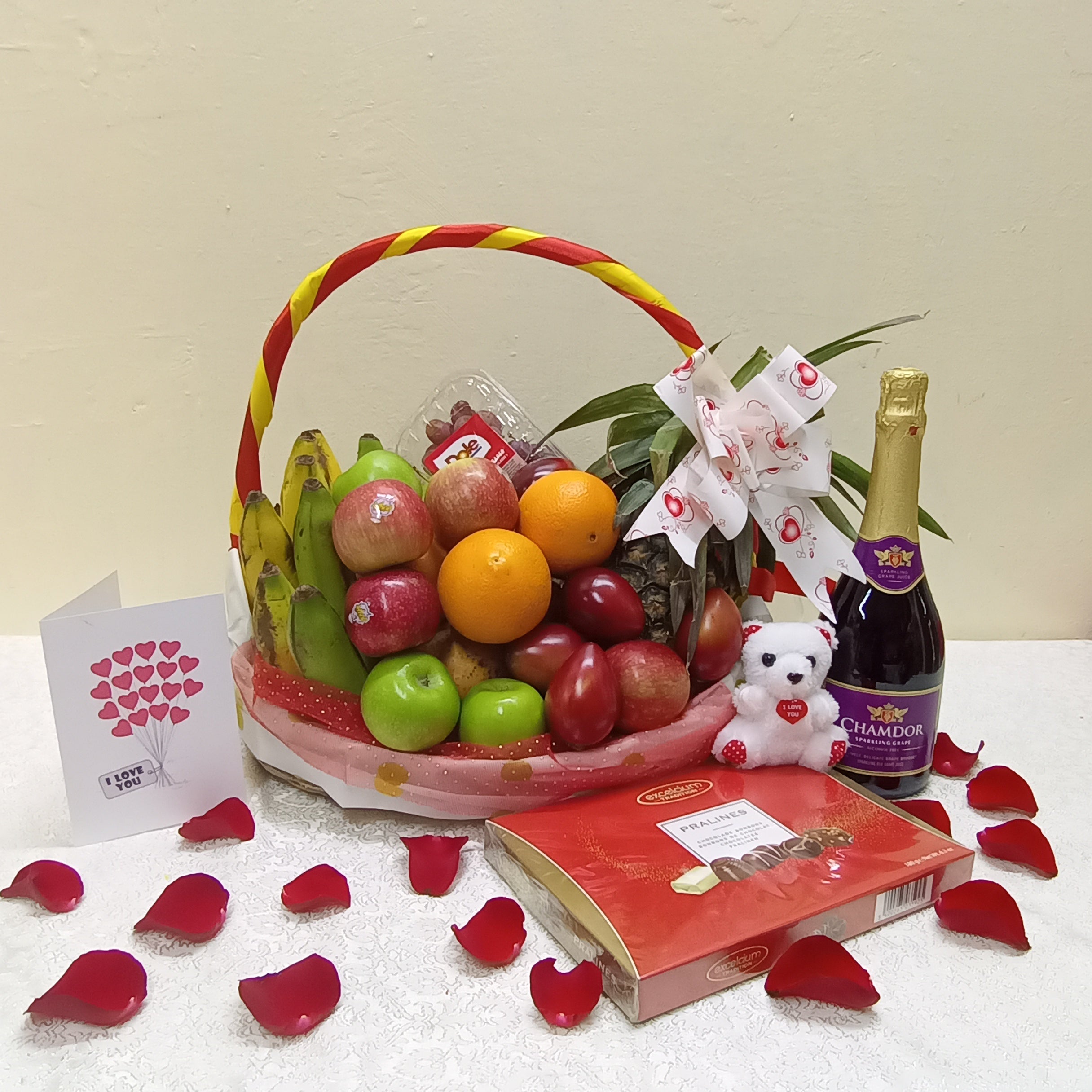 Lovers fruit basket with wine and chocolate