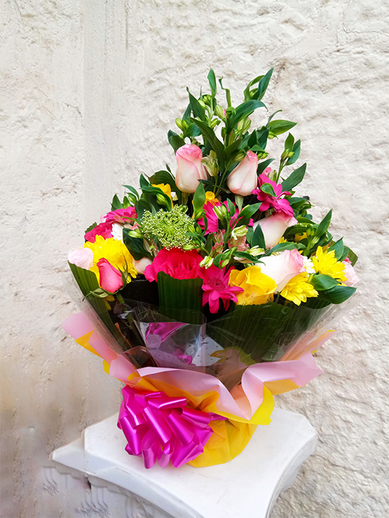 A nice water bouquet mixture of roses, alstroemeria and chrysanthemums 
