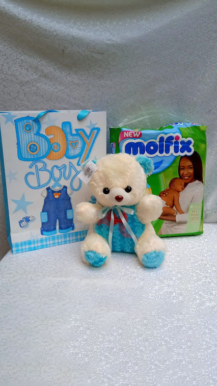 So sweet new baby package of diapers and teddy bear by Simona Flowers